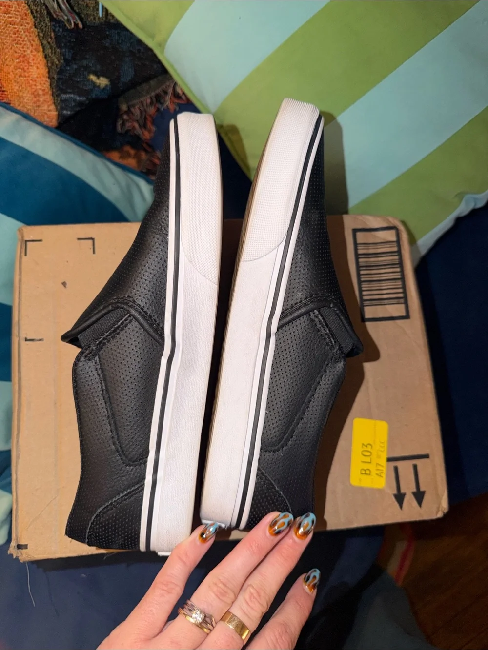 Vans Black Perforated Slip-Ons